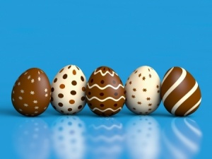 Chocolate Easter eggs on blue background